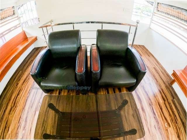 Chair in upper deck houseboat in alleppey